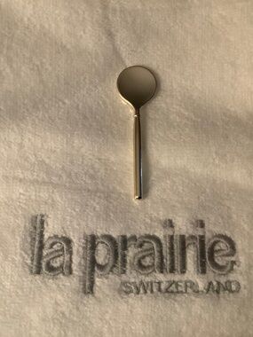 Authentic La Prairie gold-tone spatula applicator